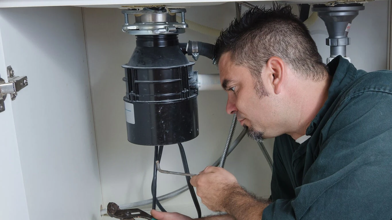 When to Call a Plumber for Garbage Disposal Repair: Fix Your Stuck Sink