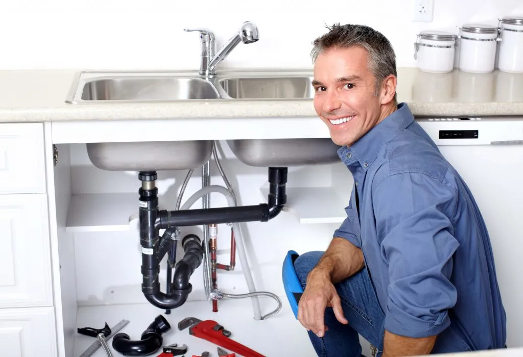 Sacramento CA plumbers working on a residential plumbing repair
